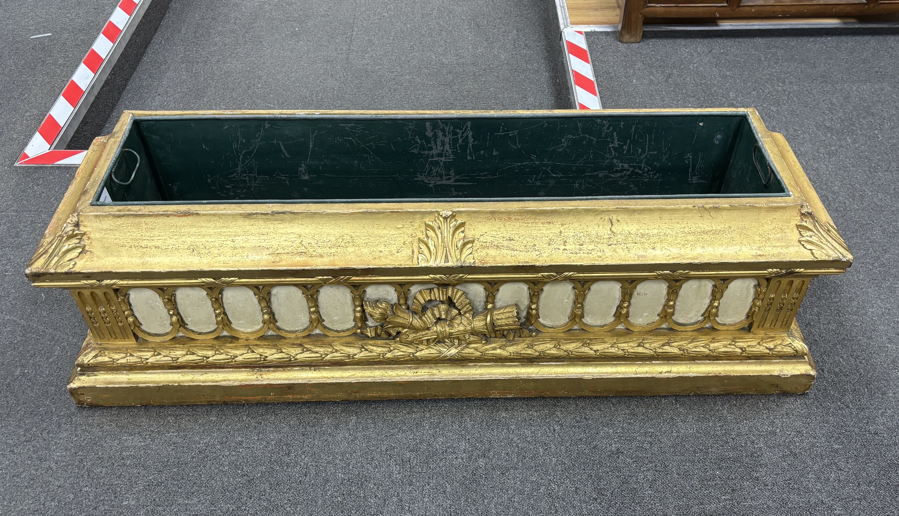 A mid 19th century giltwood and gesso jardiniere, with liner, width 120cm, depth 34cm, height 34cm